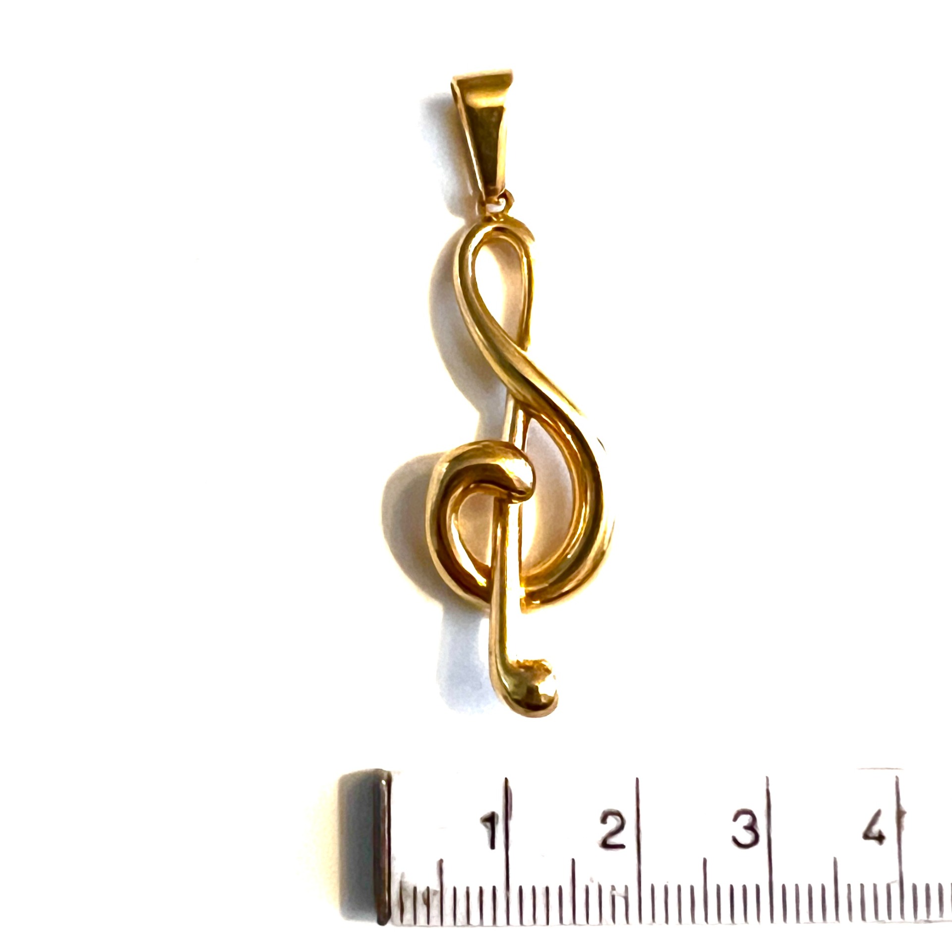 Bedel-muzieksleutel-goud