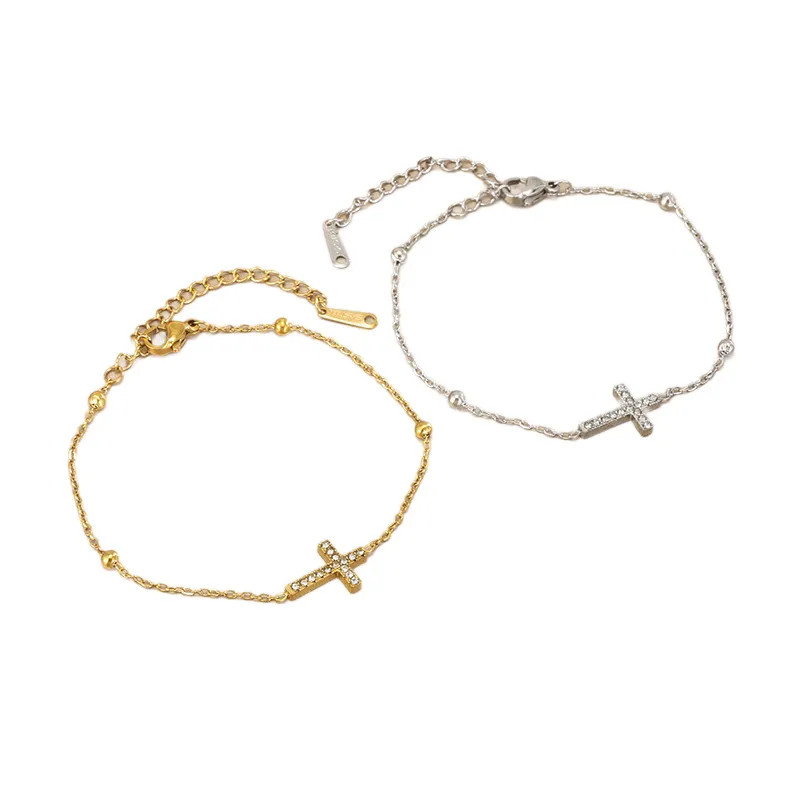 armbandjes-kruis-zirkonia-goud-zilver-rvs